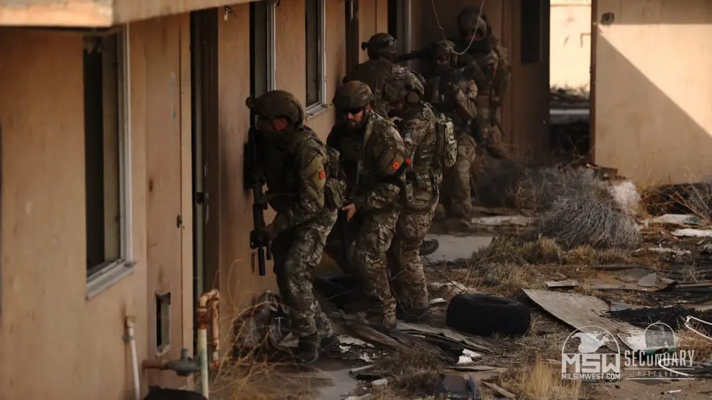 milsim west image of nato forces assaulting a building